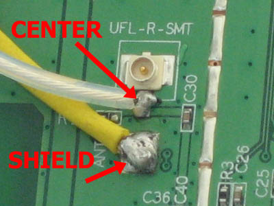 Soldiering antenna connections inside the Buffalo router