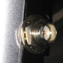 Extreme closeup of SMA connector on WiFi phone